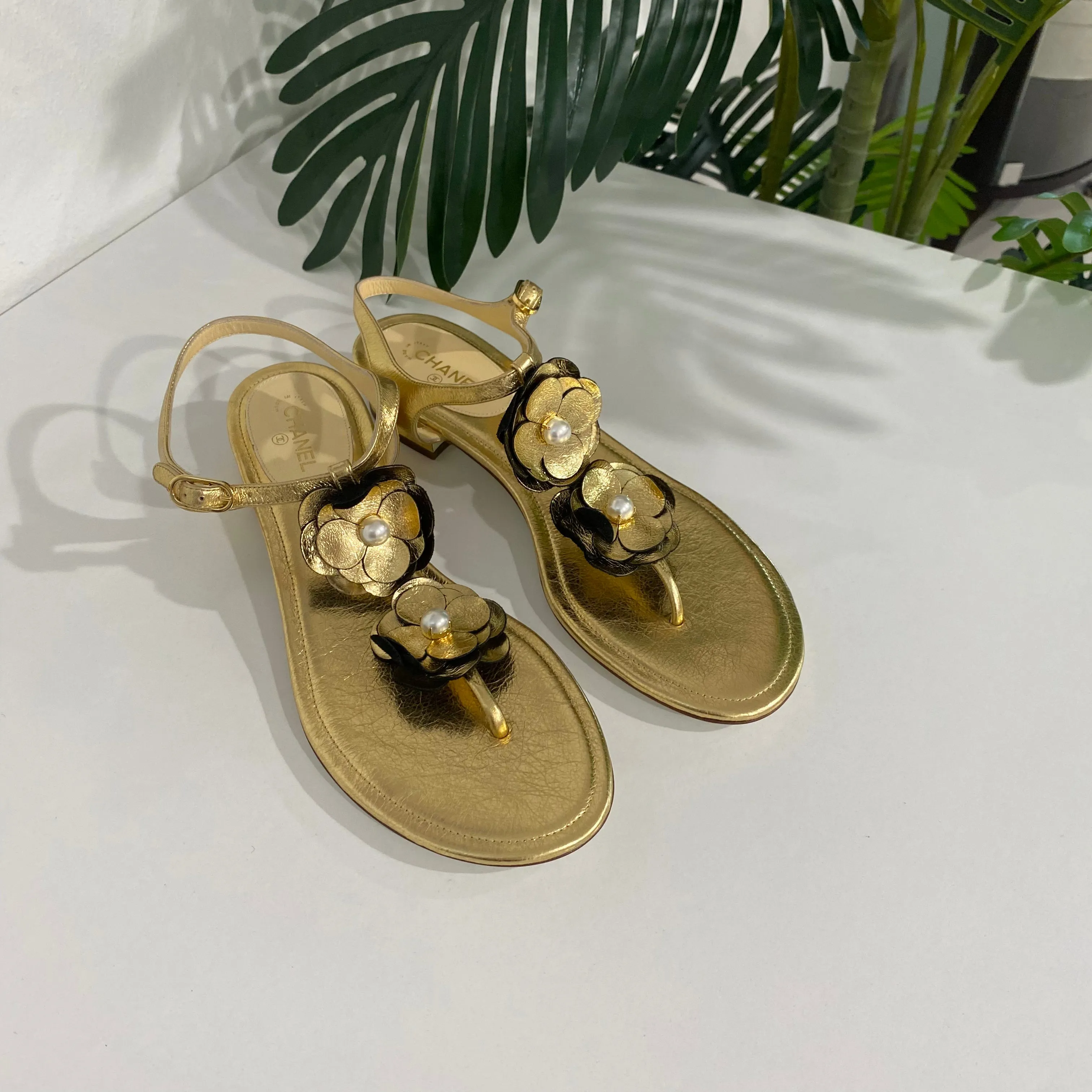 Chanel Gold Camellia Sandals